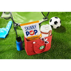 SkinnyPop White Cheddar popcorn kernels closeup highlights crispy, airy texture for snacking
