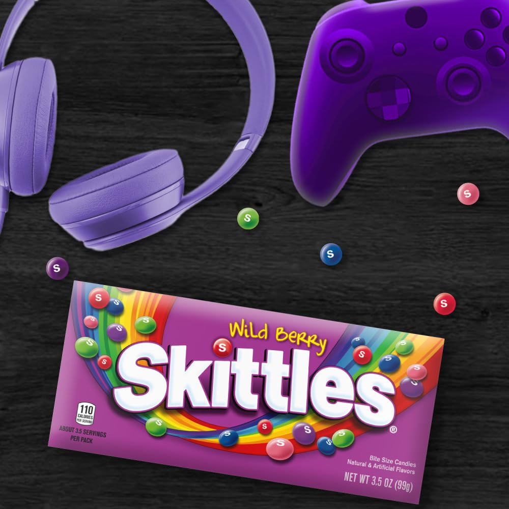Close-up of colorful Skittles chewy candies on display
