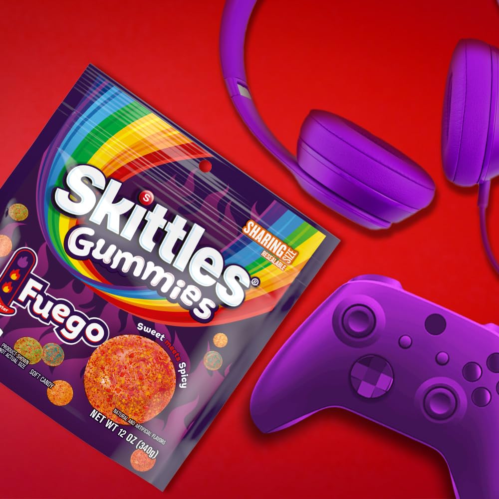 Skittles GUMMIES Fuego strawberry-flavor piece in rainbow mix for quick snacking