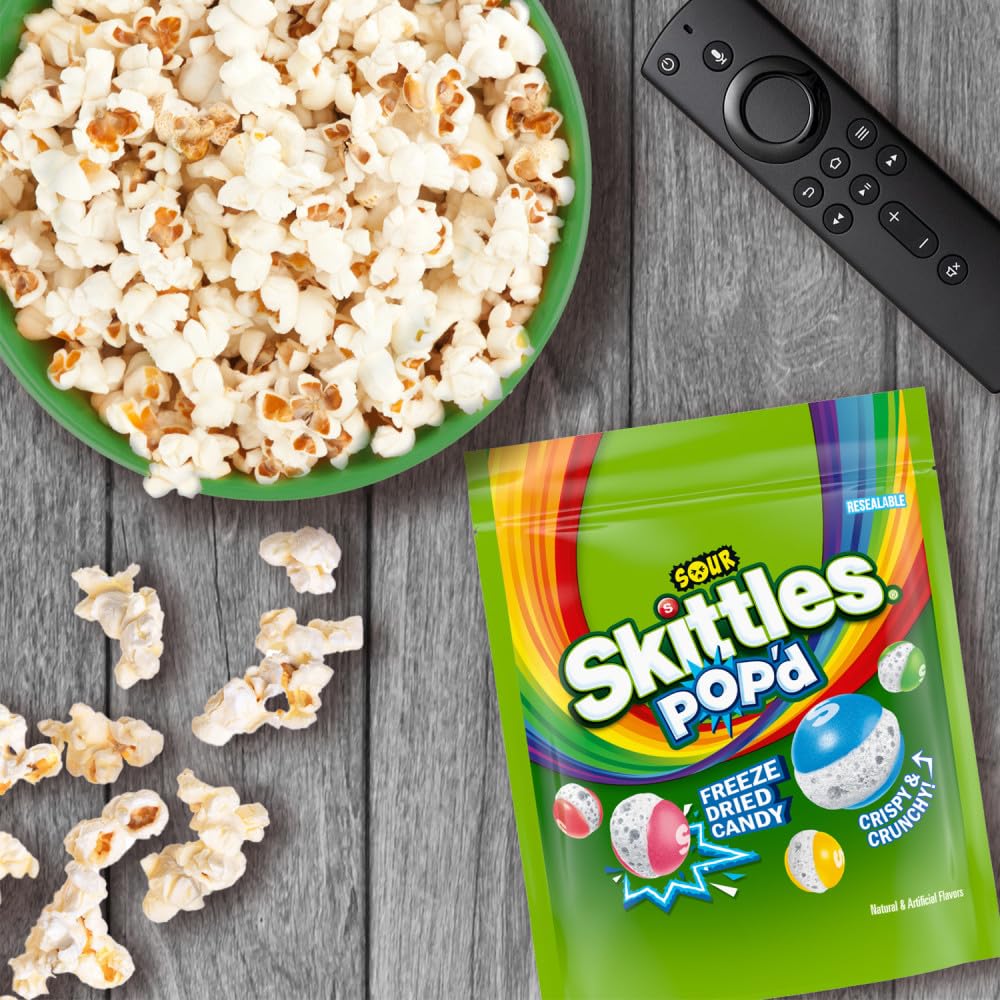 Skittles POP'd freeze-dried crunch shown in bite-sized pieces.