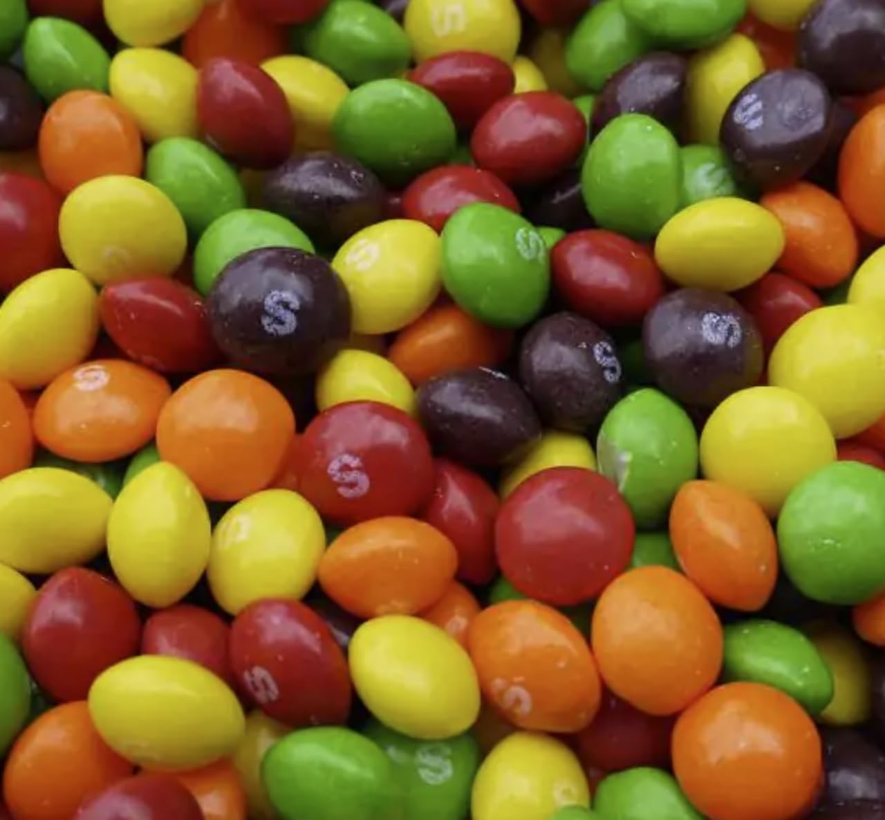 Skittles rainbow color presentation adds festive mood.