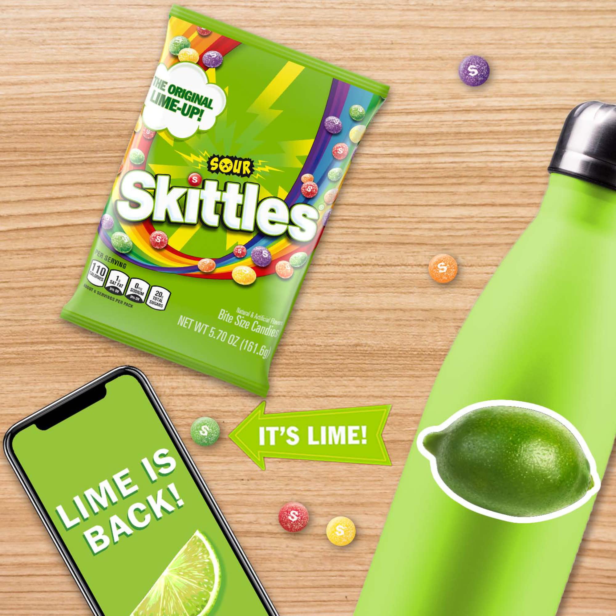 Skittles Sour Orange close-up, bold flavor pop perfect for sharing at gatherings.