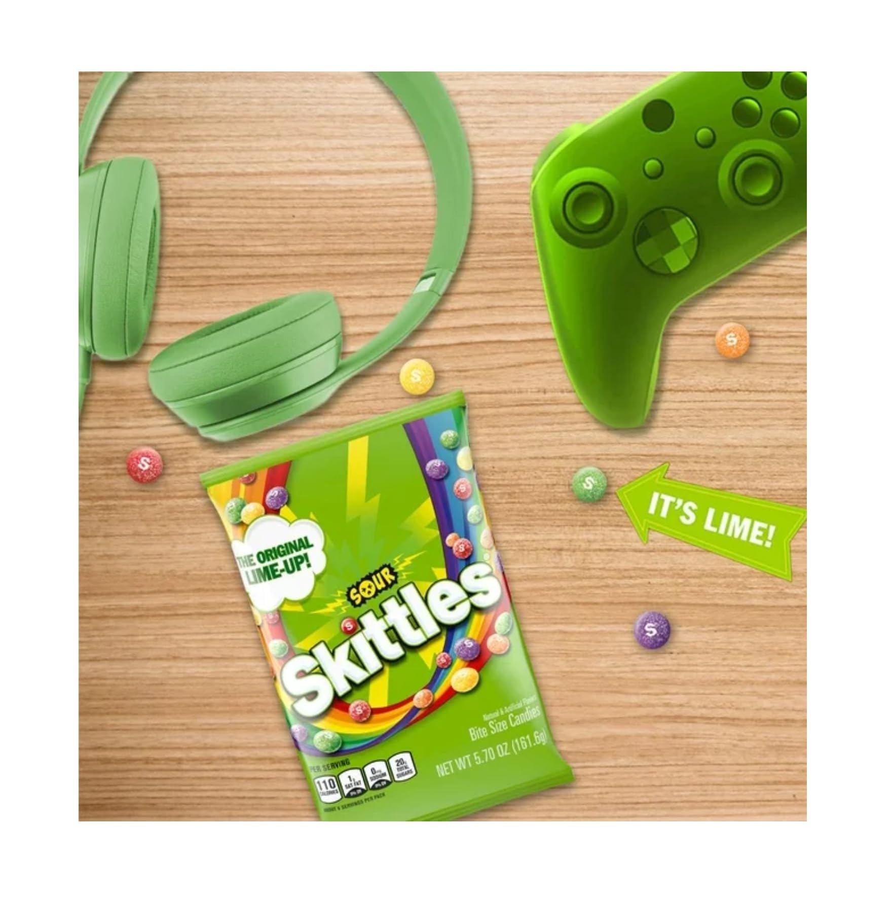 Skittles Sours on a movie-night setup with bright colors.