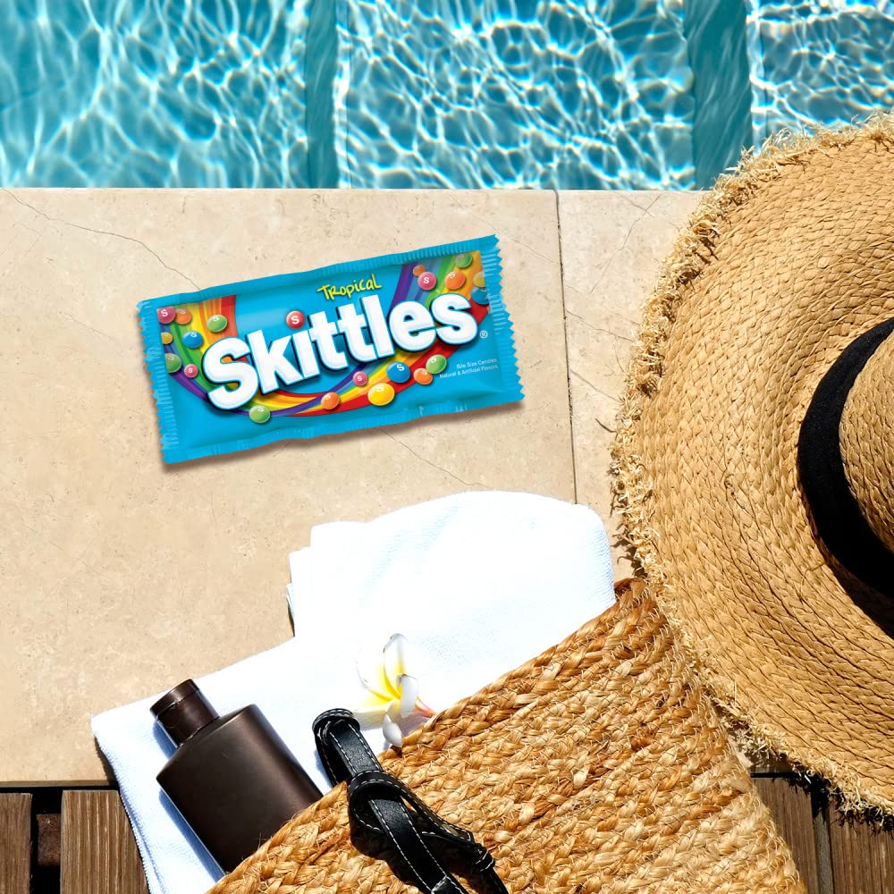 Skittles tropical as a dessert topping adding color and flavor