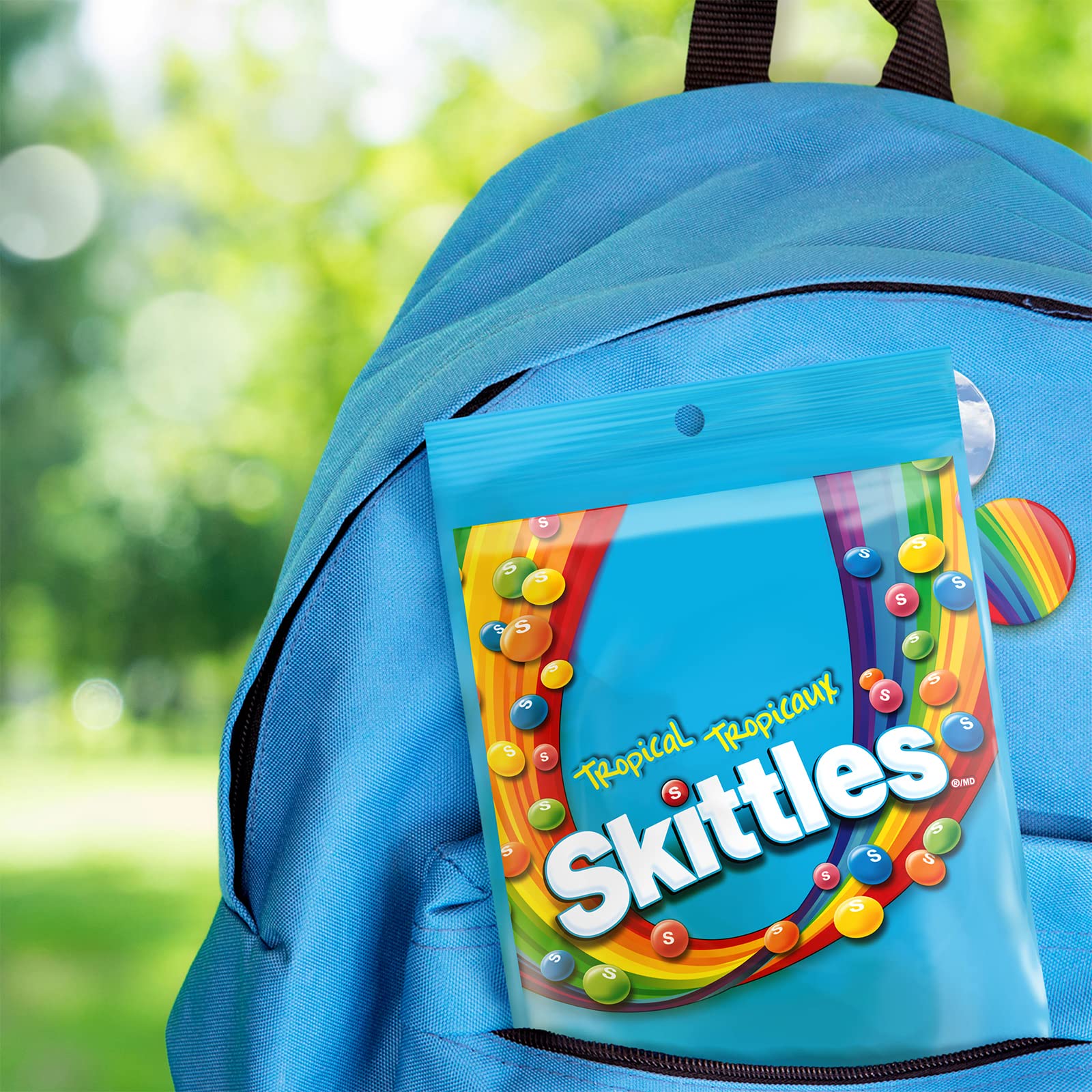 Skittles Tropical strawberry star fruit flavor close-up for tasting
