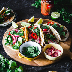 Sky Valley Taco Sauce served with burritos; gluten-free and vegan option