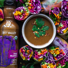 Satay skewers brushed with Sky Valley Thai Peanut Sauce.