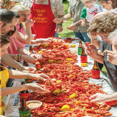 Slap Ya Mama Cajun Boil Seasoning 3-pack display for family seafood nights.