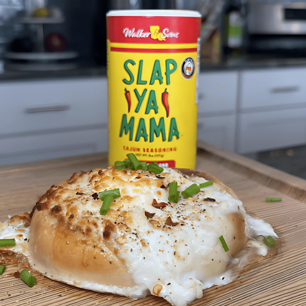 Shaker bottle of Slap Ya Mama ready for quick seasoning during cooking.