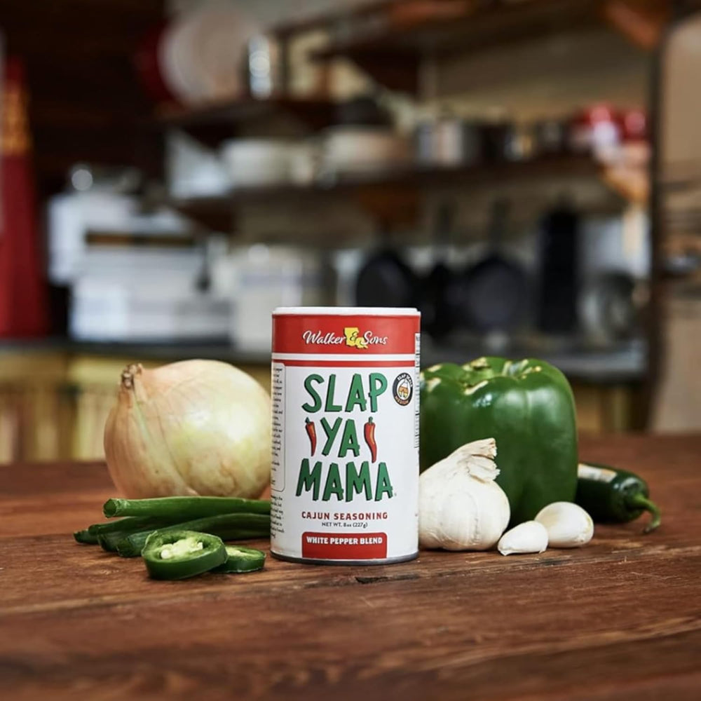 Kitchen spice rack display featuring Slap Ya Mama Cajun white pepper blend