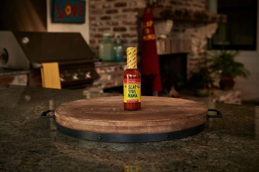 Slap Ya Mama hot sauce close-up texture highlights robust seasoning.