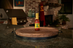 Slap Ya Mama hot sauce close-up texture highlights robust seasoning.