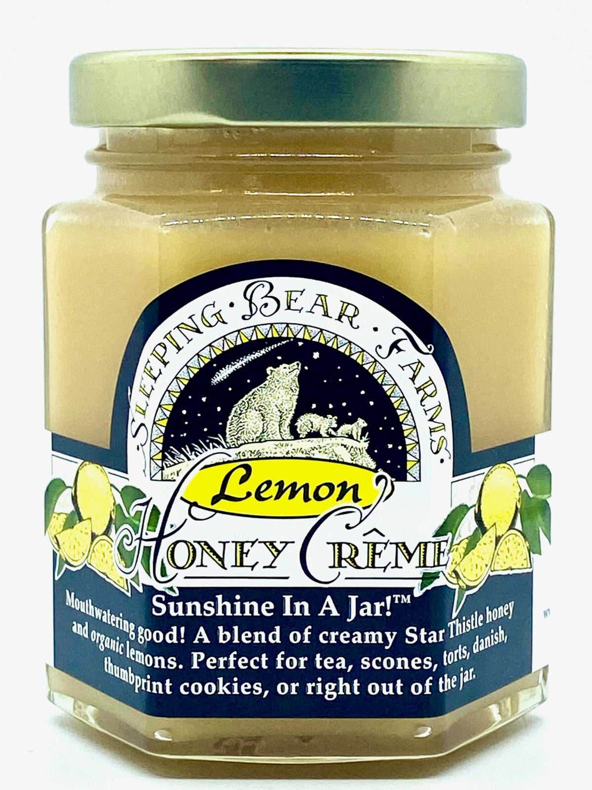 Sleeping Bear Farms Lemon Crème Honey jar close-up showing creamy texture and golden color.