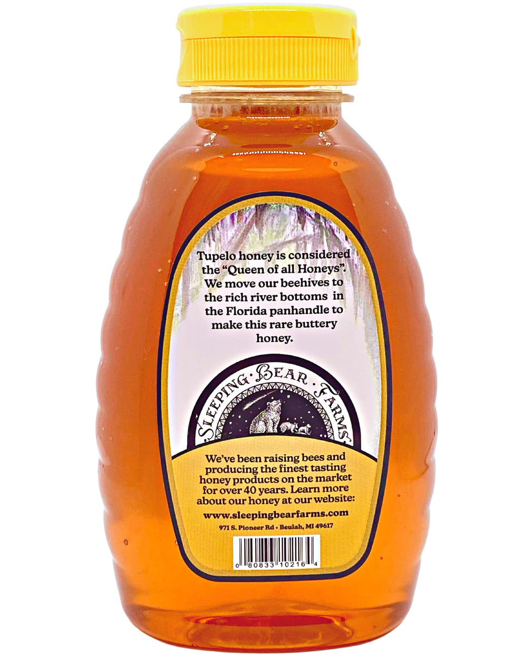 Tupelo honey in a jar with light reflections from Sleeping Bear Farms