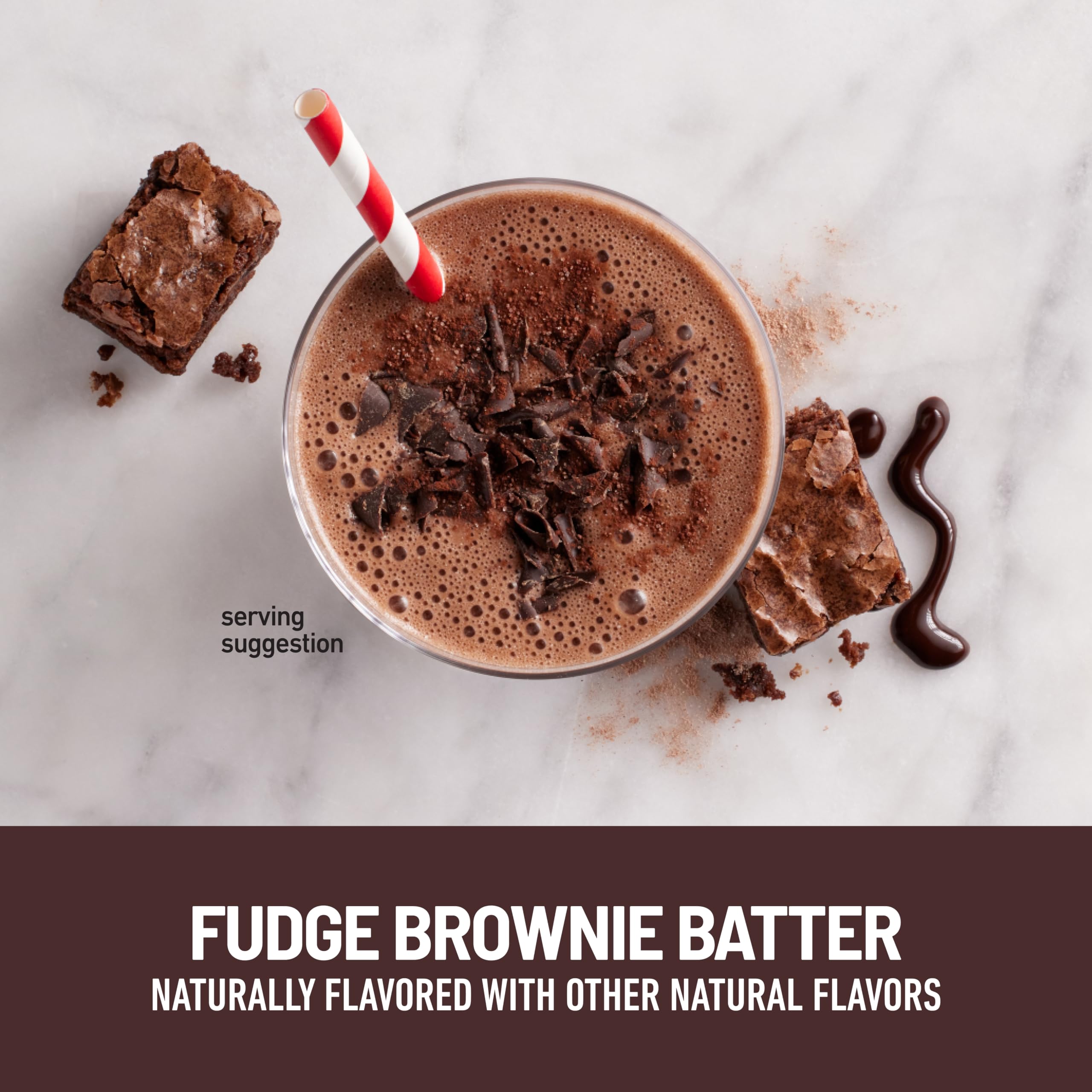 Pouring SlimFast Keto fudge brownie batter shake into a glass for a low carb meal