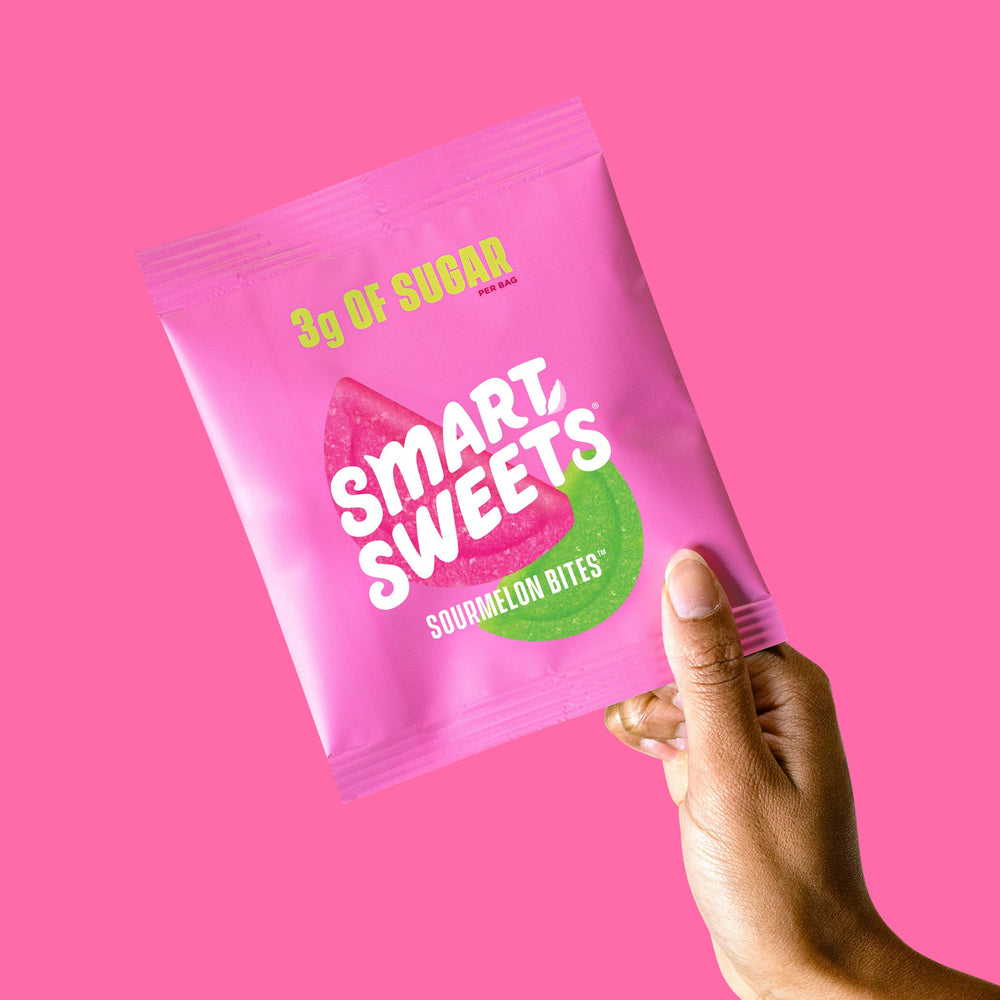 SmartSweets Sourmelon Bites bag close-up showing glossy pink gummies.