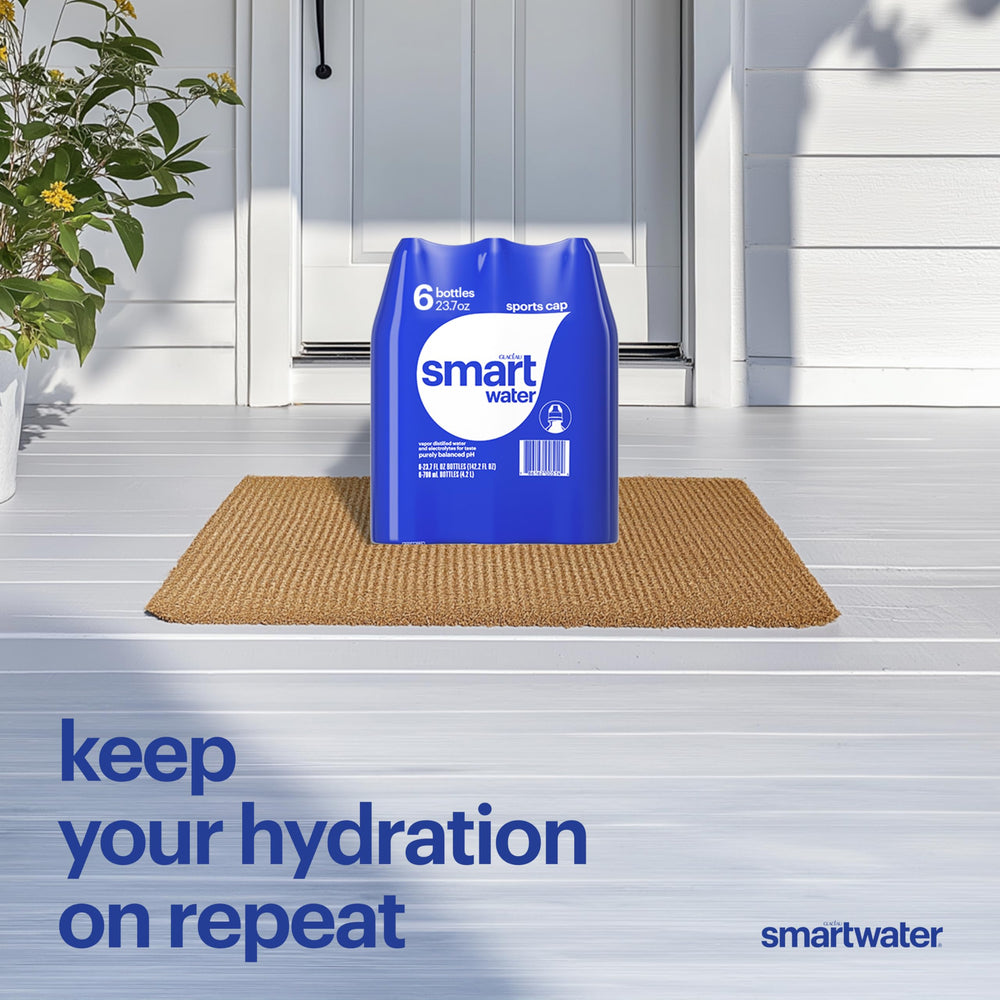 Smartwater office hydration moment keeps you refreshed during work.