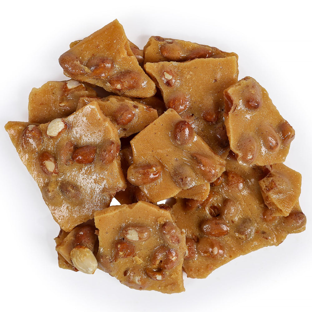 Smarty Stop Home Style Peanut Brittle pieces close-up reveals roasted peanuts.