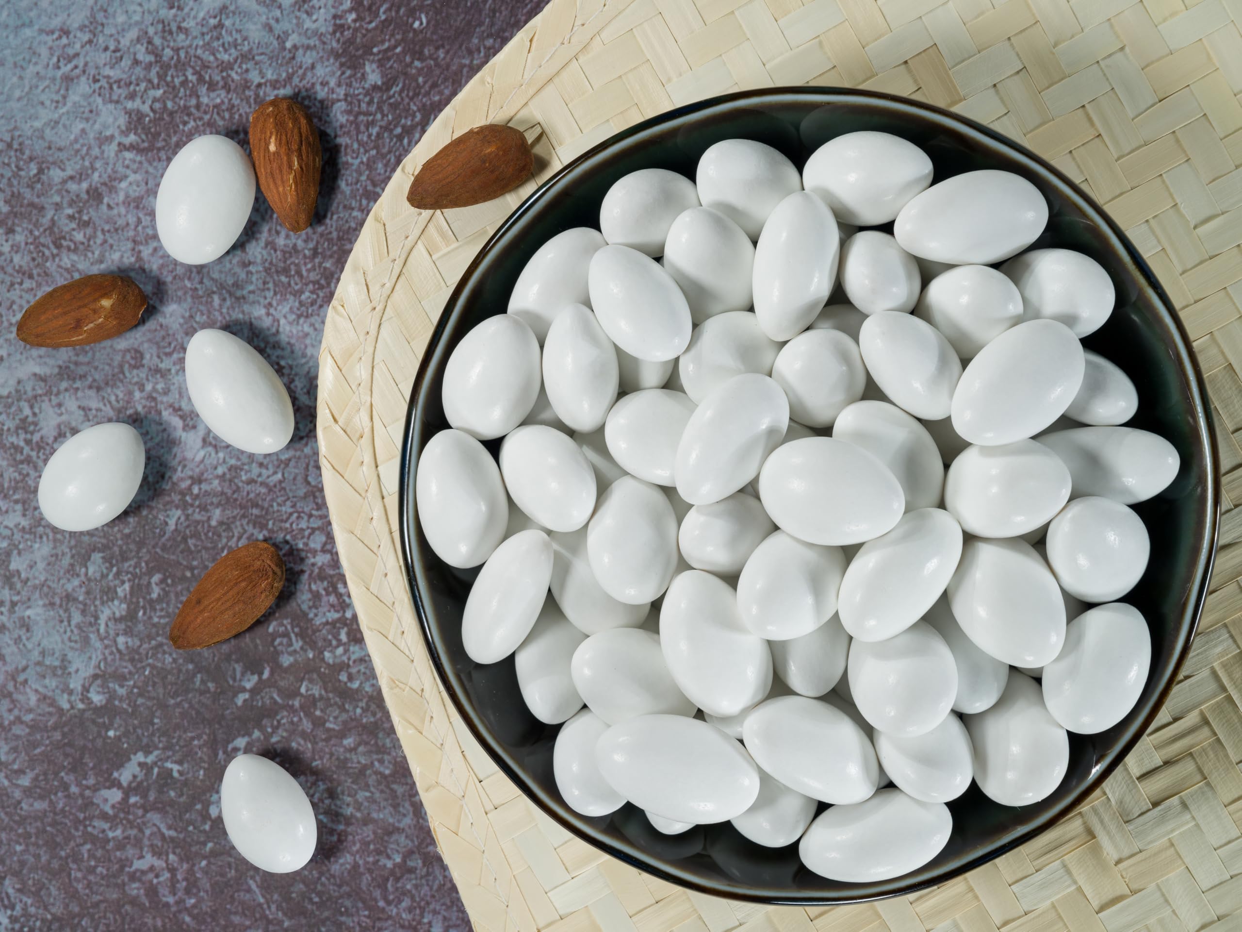 Smarty Stop Jordan Almonds candy bowl display enhances party tables.