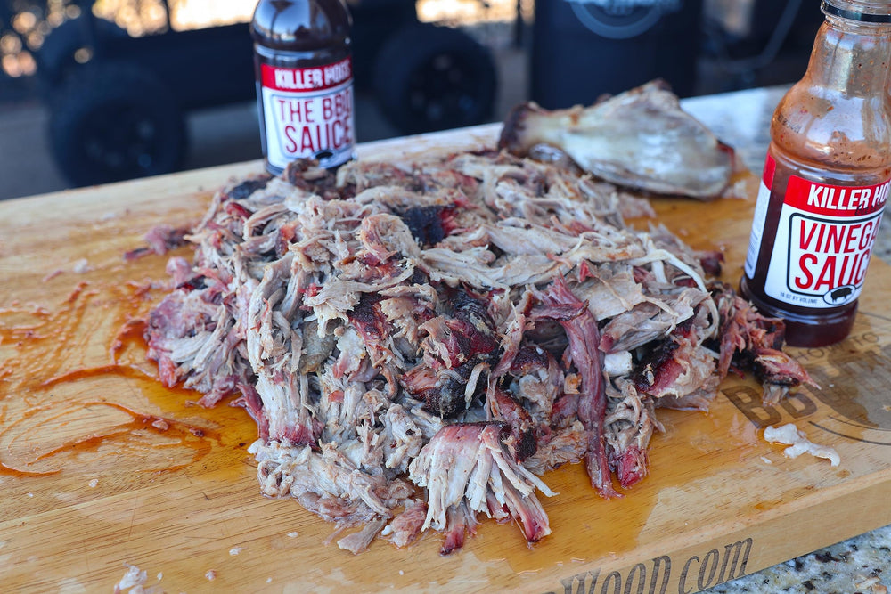 Smoked pork ribs featuring Killer Hogs Vinegar Sauce for zesty tang.