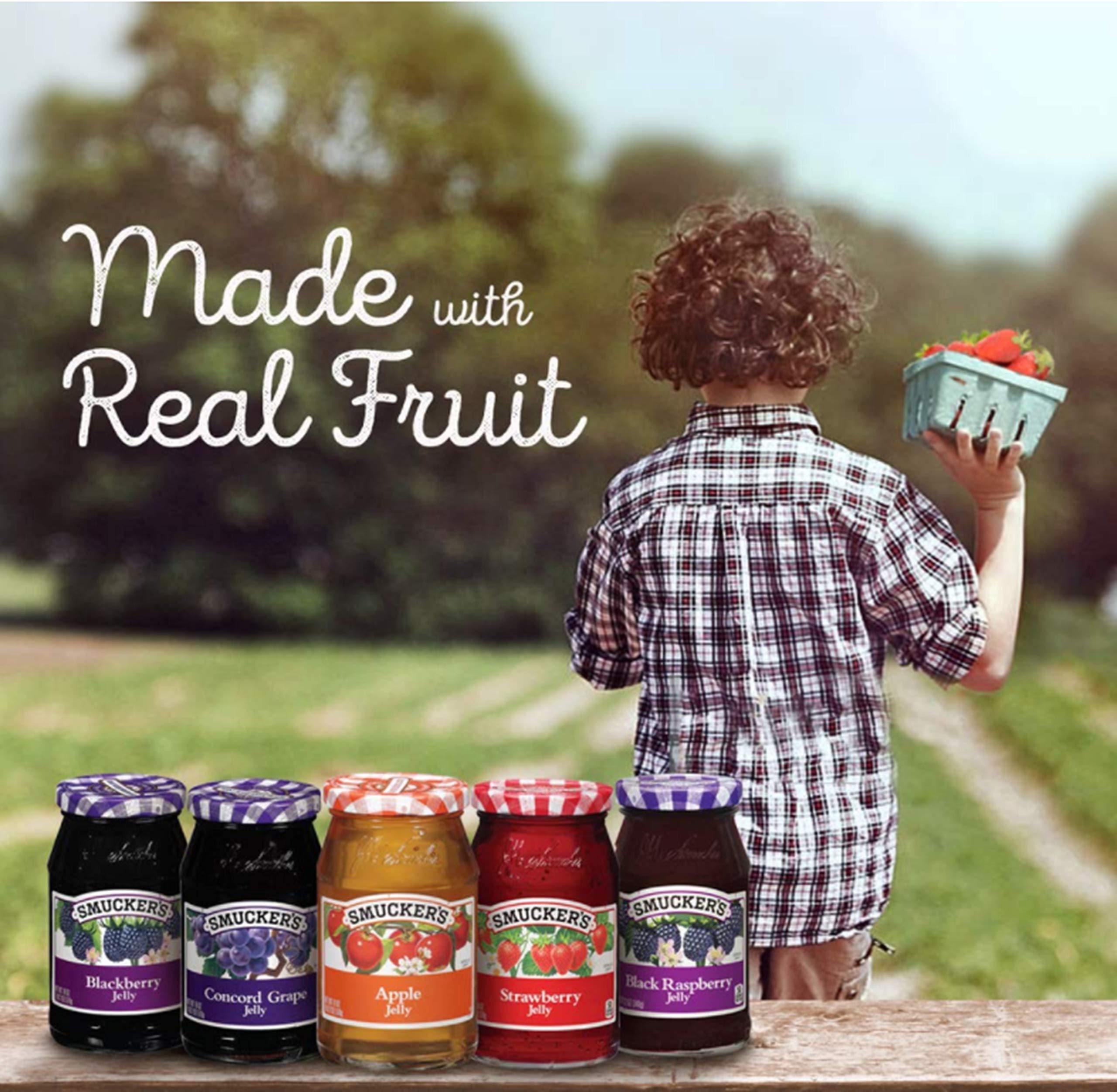 Smucker's Concord Grape Jelly spooned on toast, great for quick breakfasts.