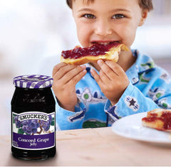 Smucker's Concord Grape Jelly glaze on meatballs for an easy, flavorful appetizer.