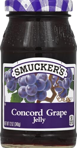 Closeup of Smucker's Concord Grape Jelly jar highlighting rich color and glossy texture