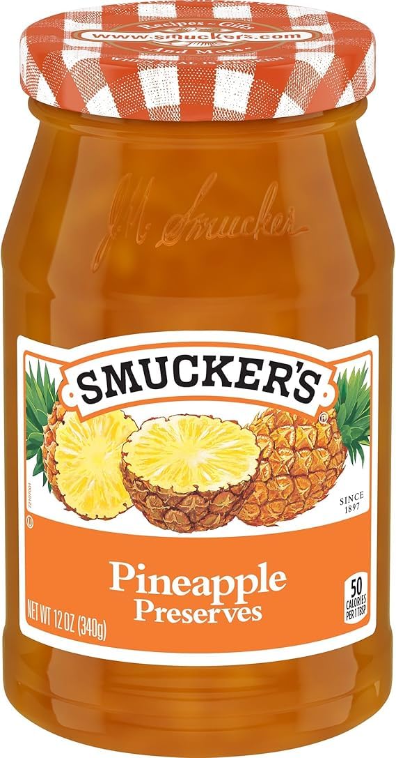 Smucker's Pineapple Preserves jar with glossy pineapple spread, ideal as a dessert topping