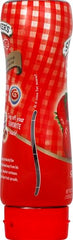 Smucker's Squeeze Strawberry Spread being poured into a bowl