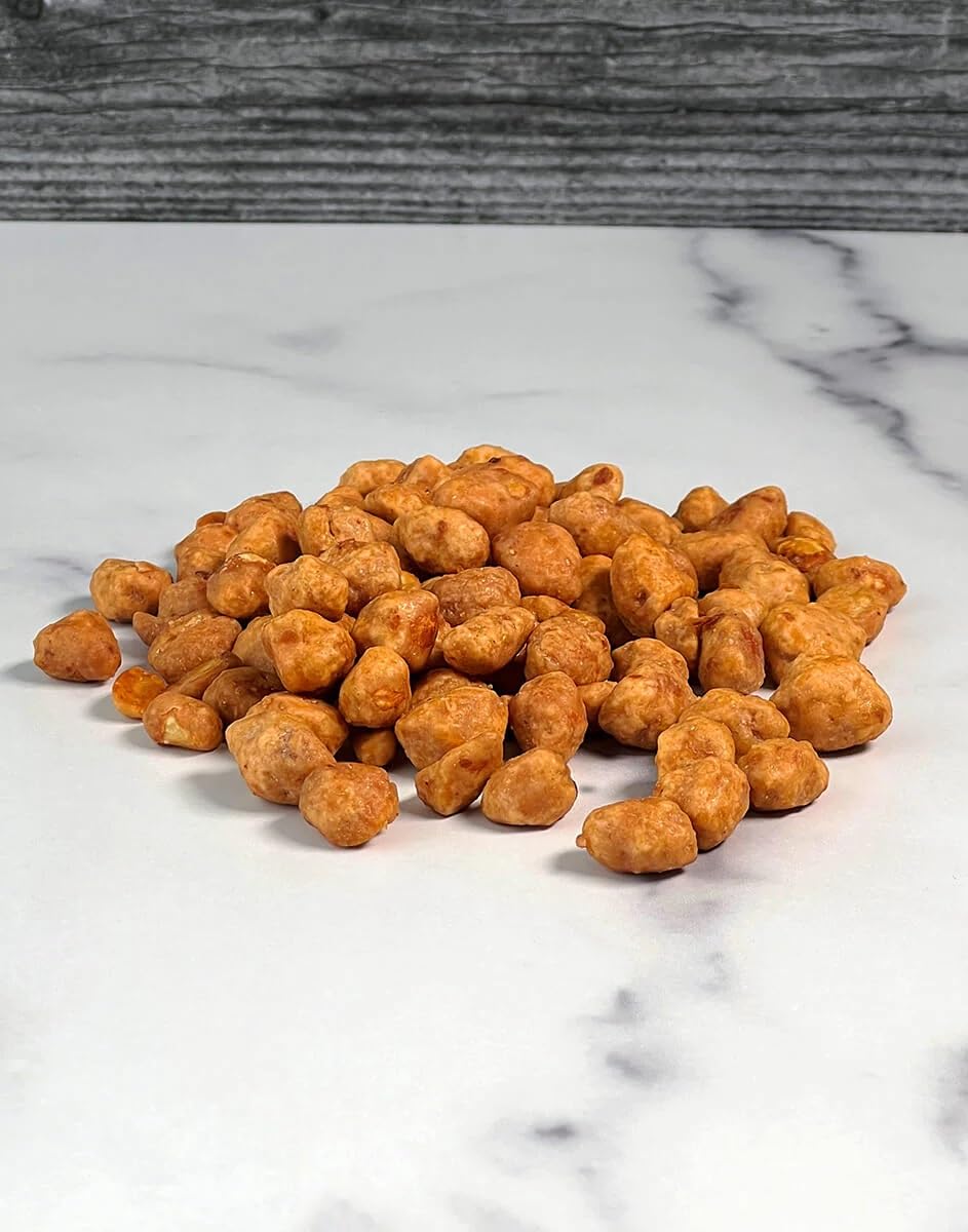 Snack Delight butter toffee peanuts closeup showing crispy coating and premium roasted texture for flavor seekers.