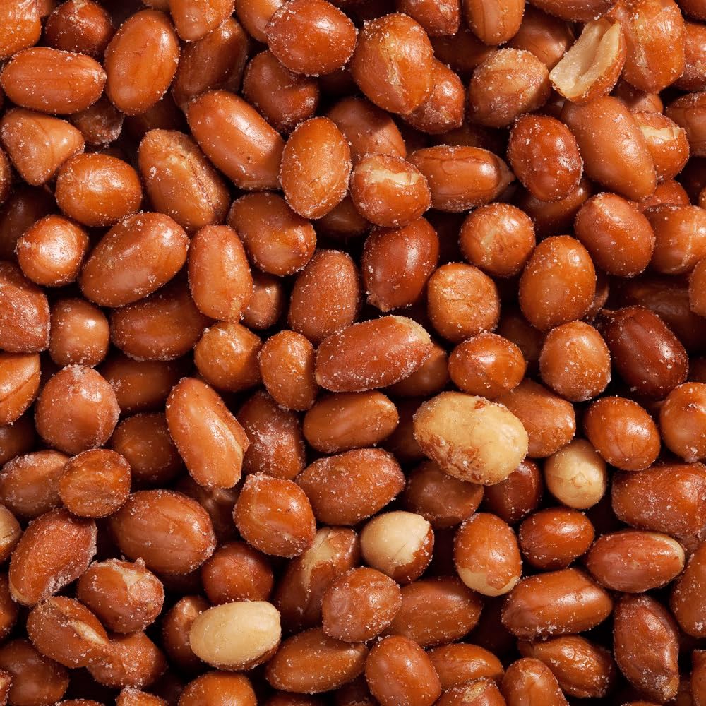 Snack Delight red skin Spanish peanuts sealed bag conveys freshness and convenience.