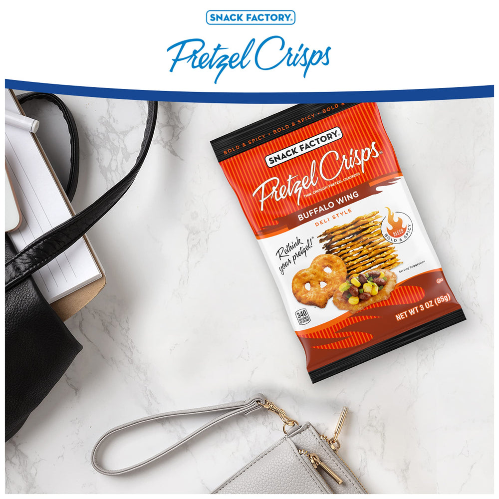 Snack Factory Buffalo Wing Pretzel Crisps with cheese dip as an option.