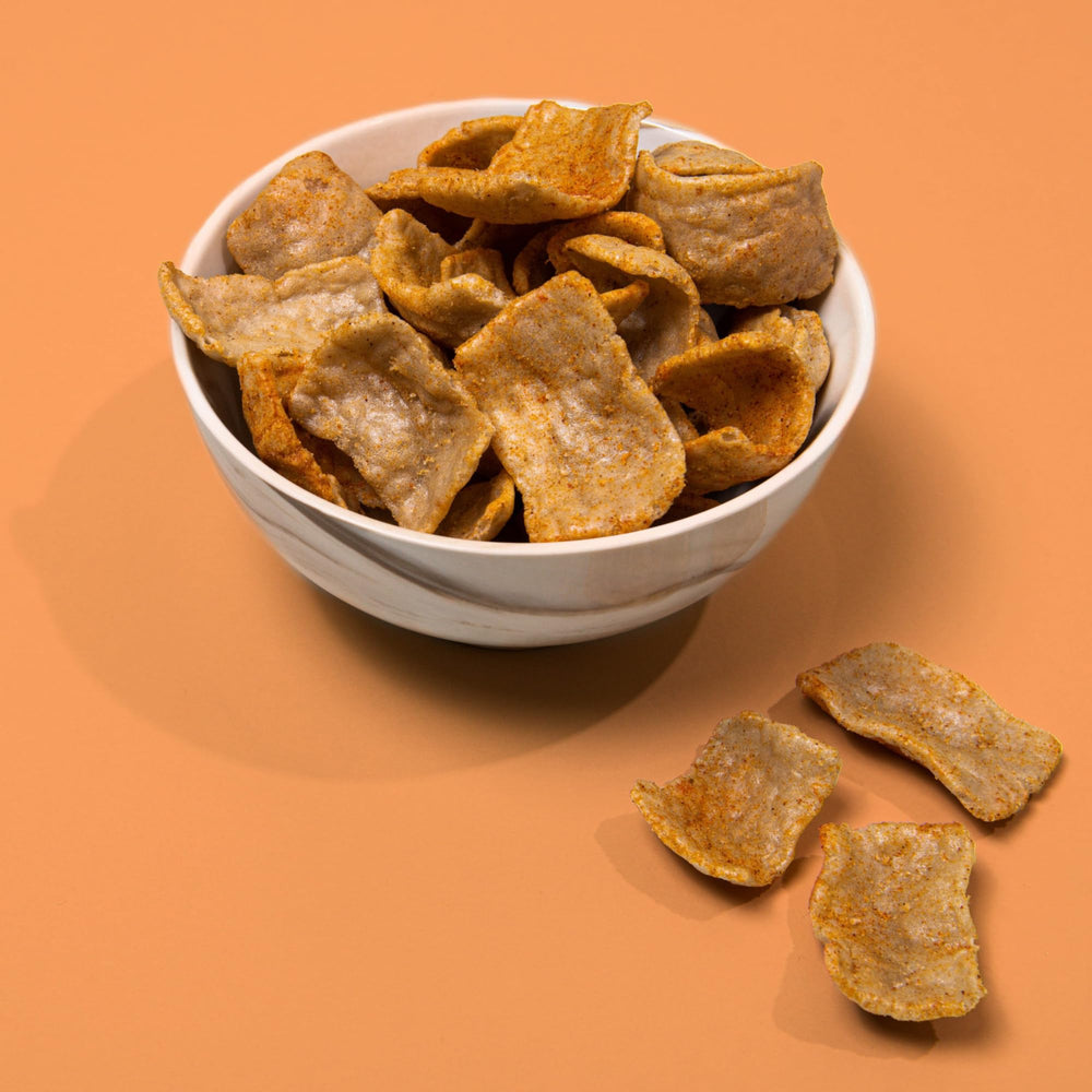 SNACKLINS Nacho Plant Crisps on a party platter inviting tastings