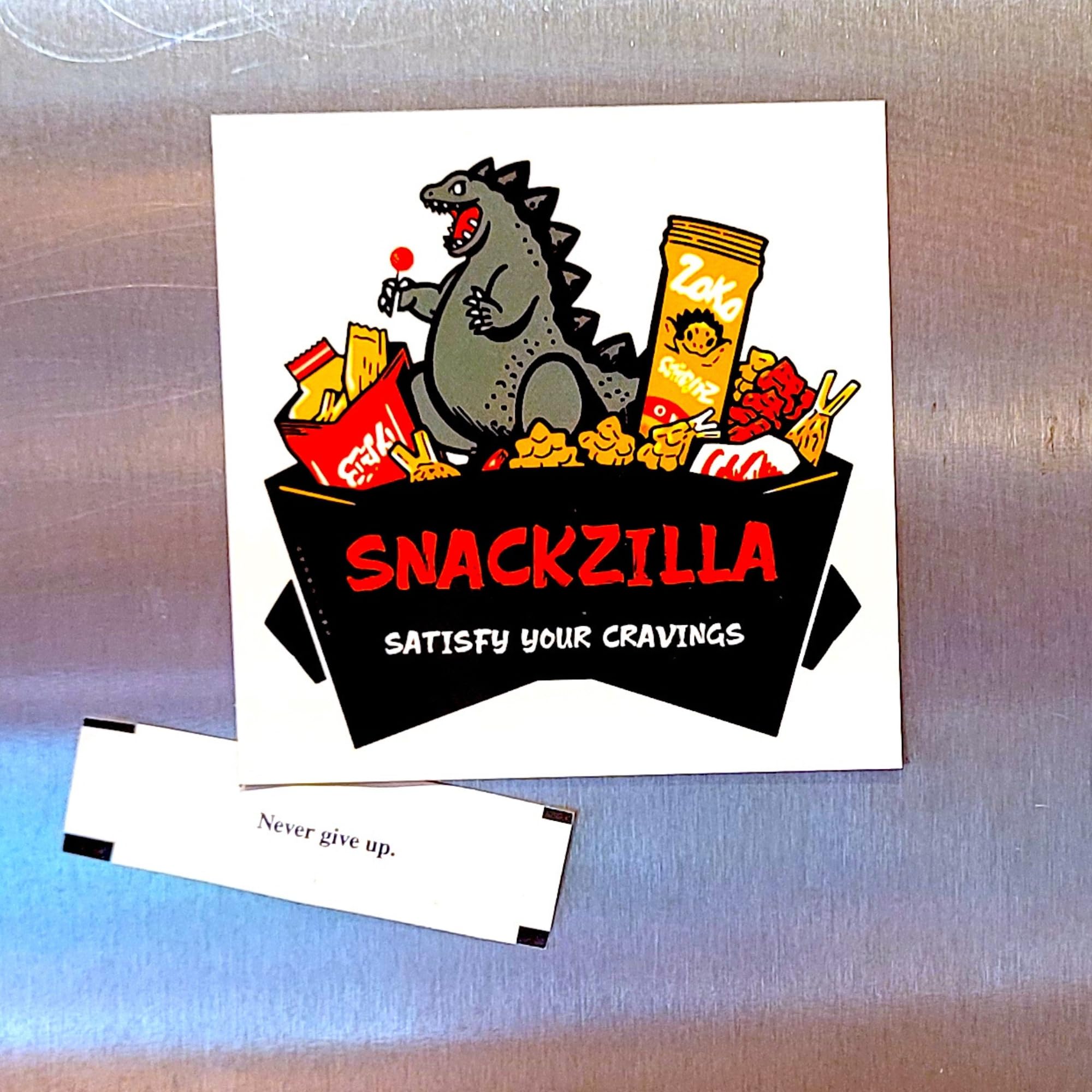 Snackzilla fortune cookies arranged for a festive party platter.