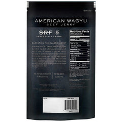 Close-up of Wagyu jerky texture showing rich marbling for premium snack flavor from Snake River Farms.