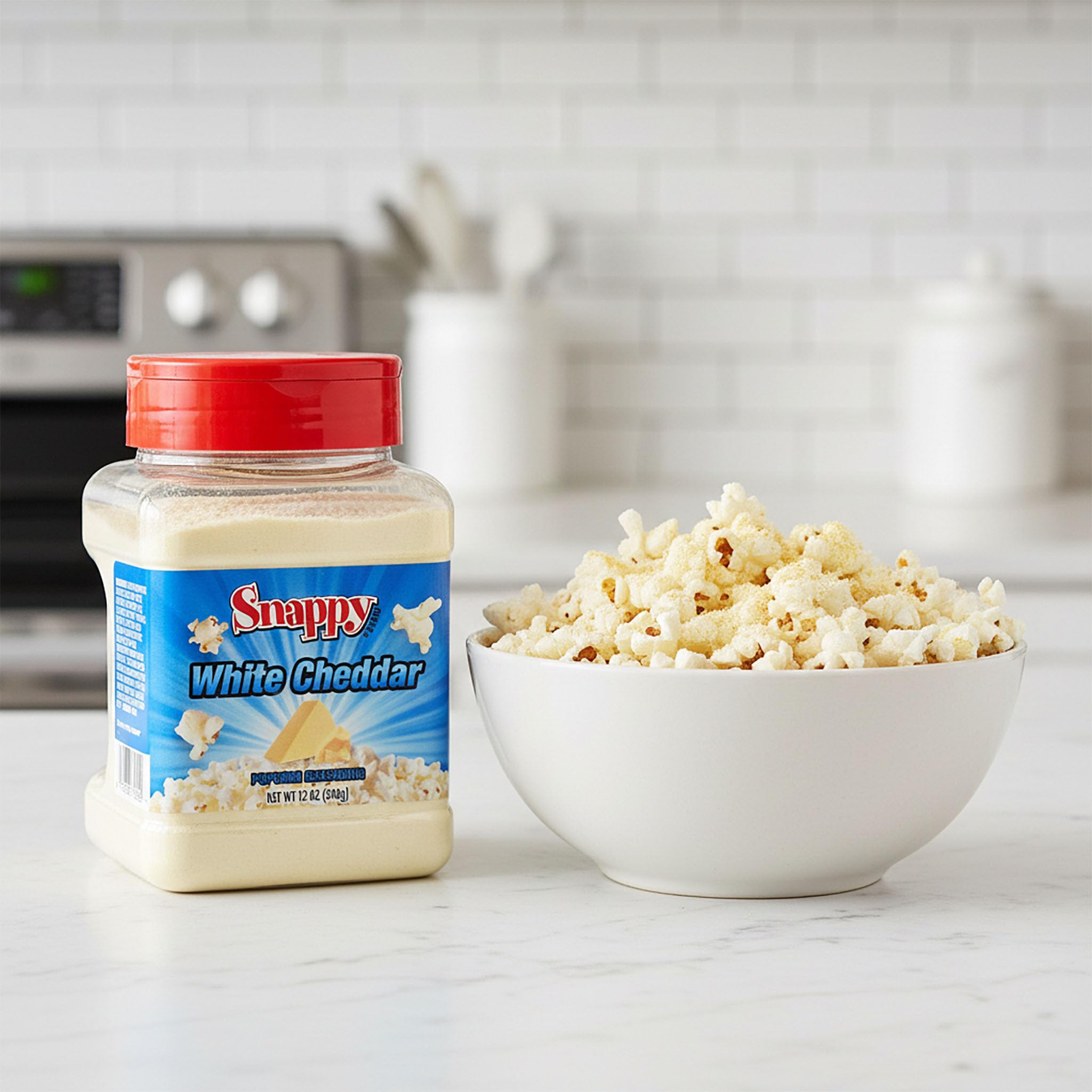 SNAPPY White Cheddar seasoning on crispy fries for a savory finish