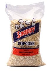 SNAPPY white popcorn kernels popping into light puffs in a machine