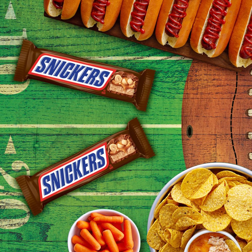 SNICKERS bar texture close-up highlighting chocolate, caramel, and peanuts