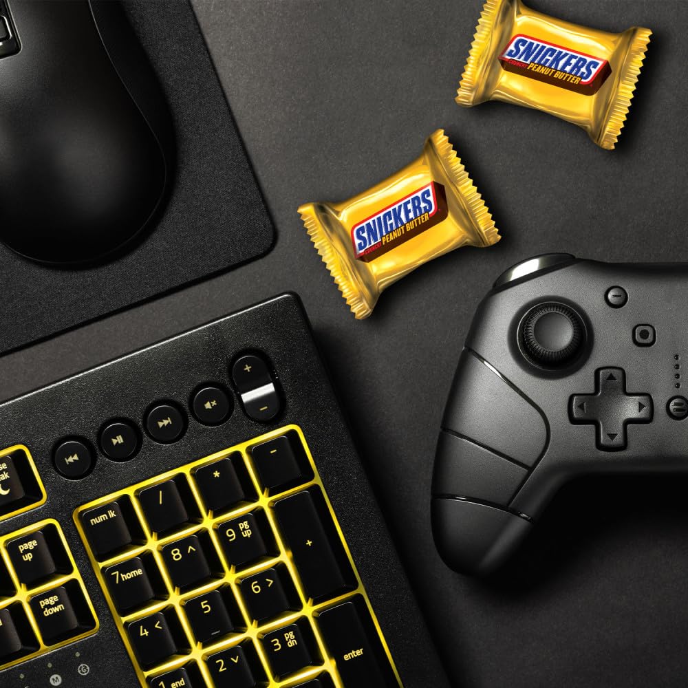 Chocolate coating and chewy center in Snickers Crunchy Peanut Butter Squares.