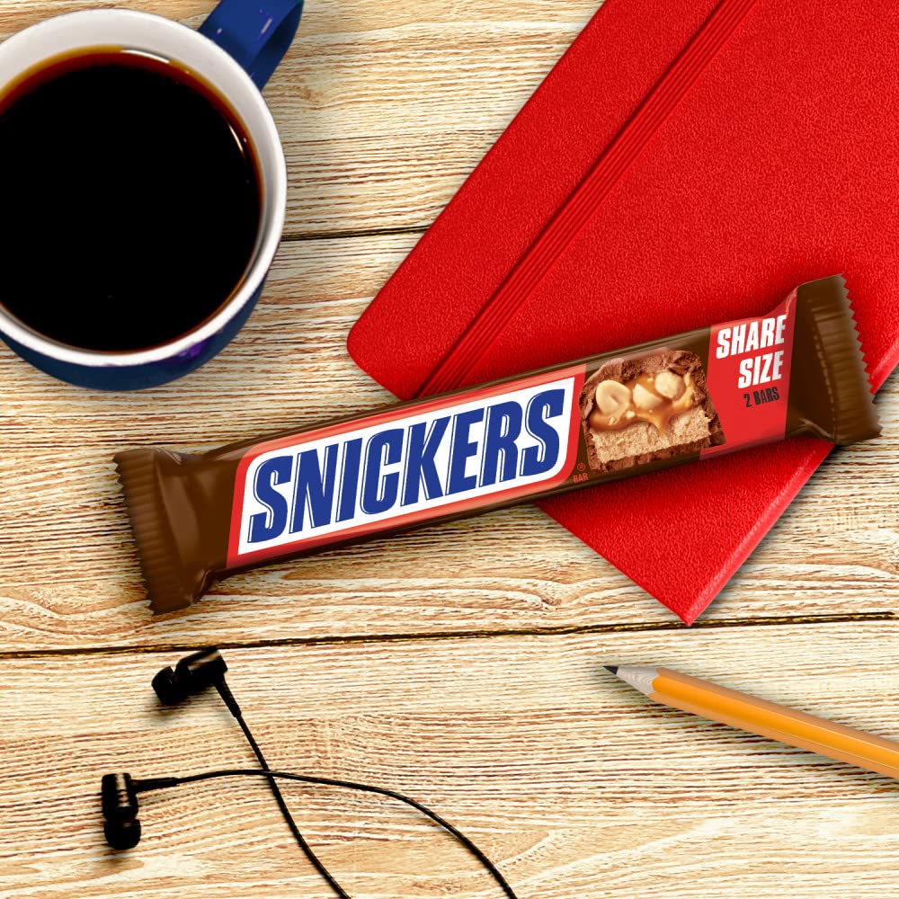 Party table with Snickers bars ready for guests.