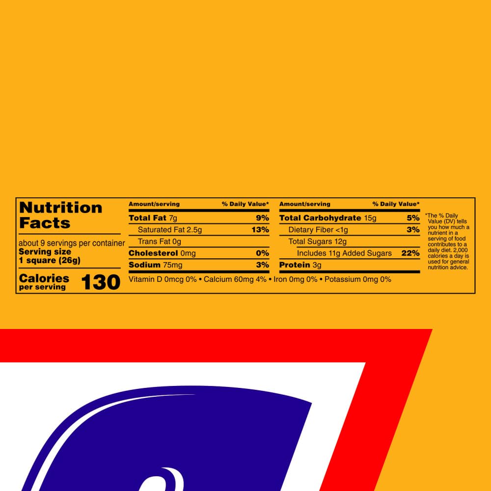 Snickers peanut butter caramel closeup showcases creamy filling and crunchy peanuts.