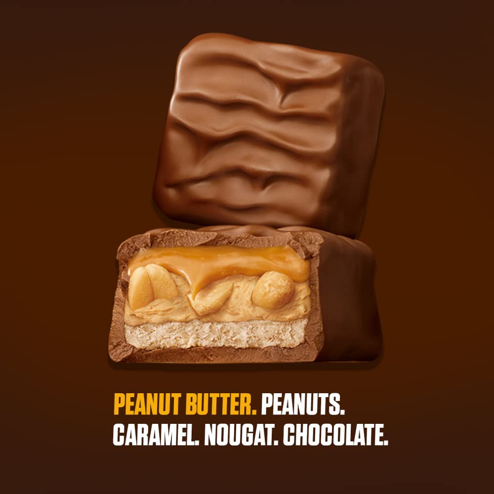Close up of peanuts and caramel inside Snickers Squared