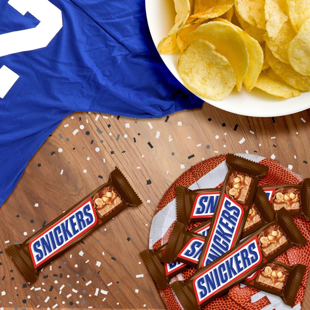 Tailgate setup featuring SNICKERS for easy snacking between plays