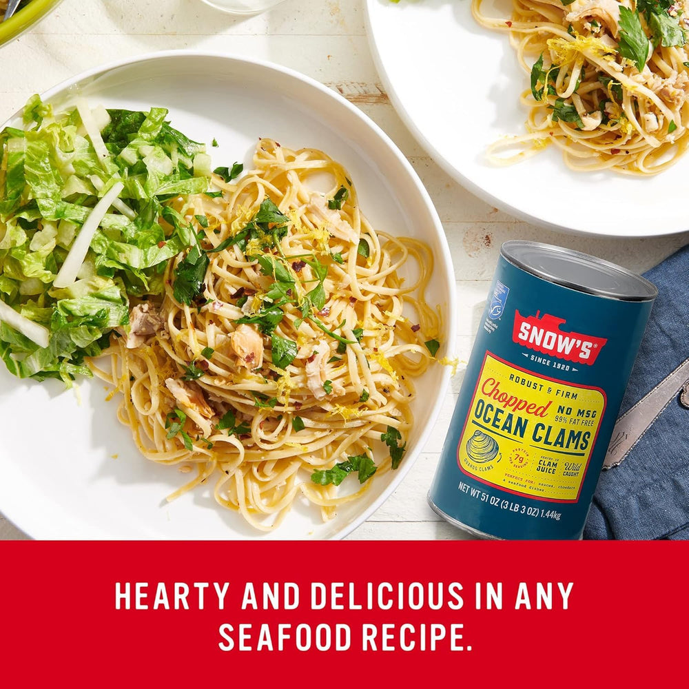 Snow's Ocean Clams kitchen-scene highlights convenient pantry staple for seafood sauces.