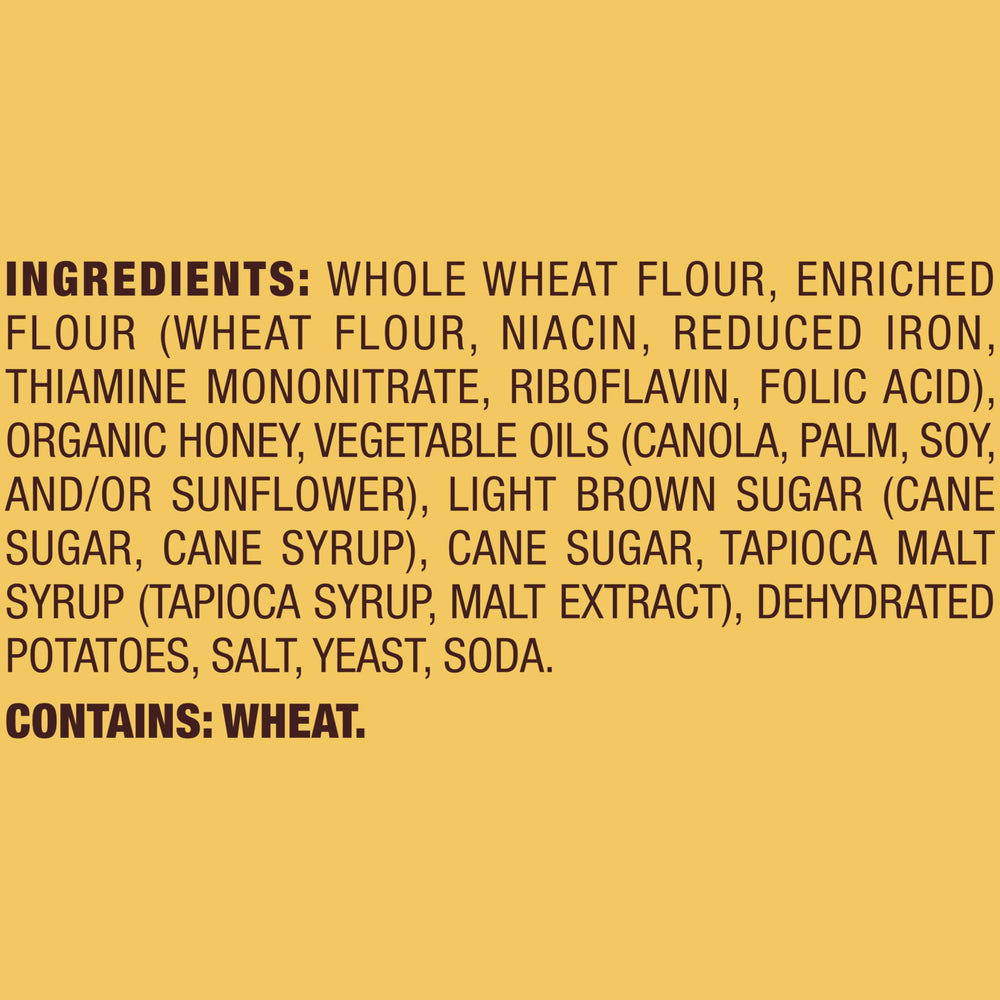 Snyder's of Hanover Honey Wheat Braided Twists with dip, ideal for hummus or cheese.