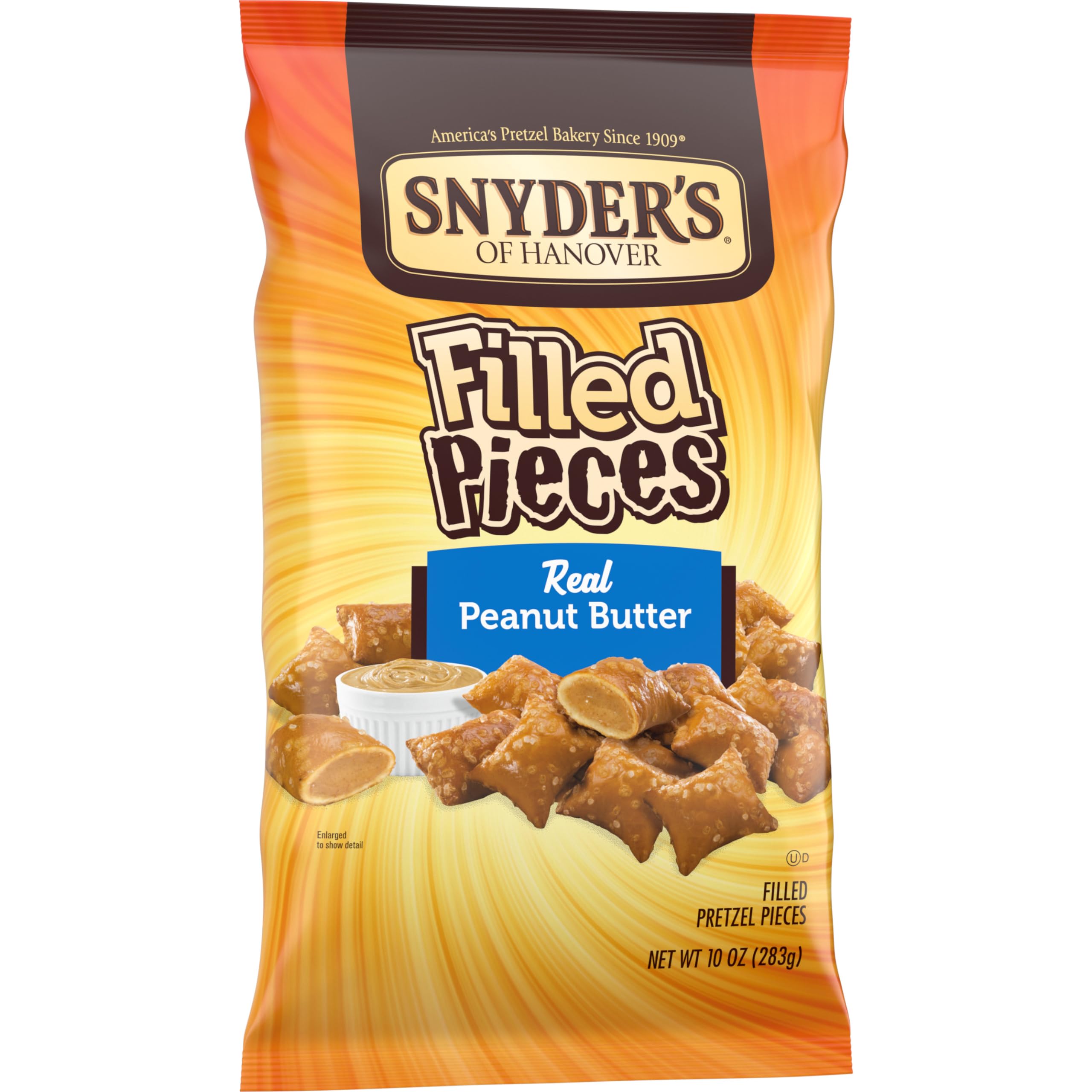 Crispy pretzel texture with smooth peanut butter center close-up.