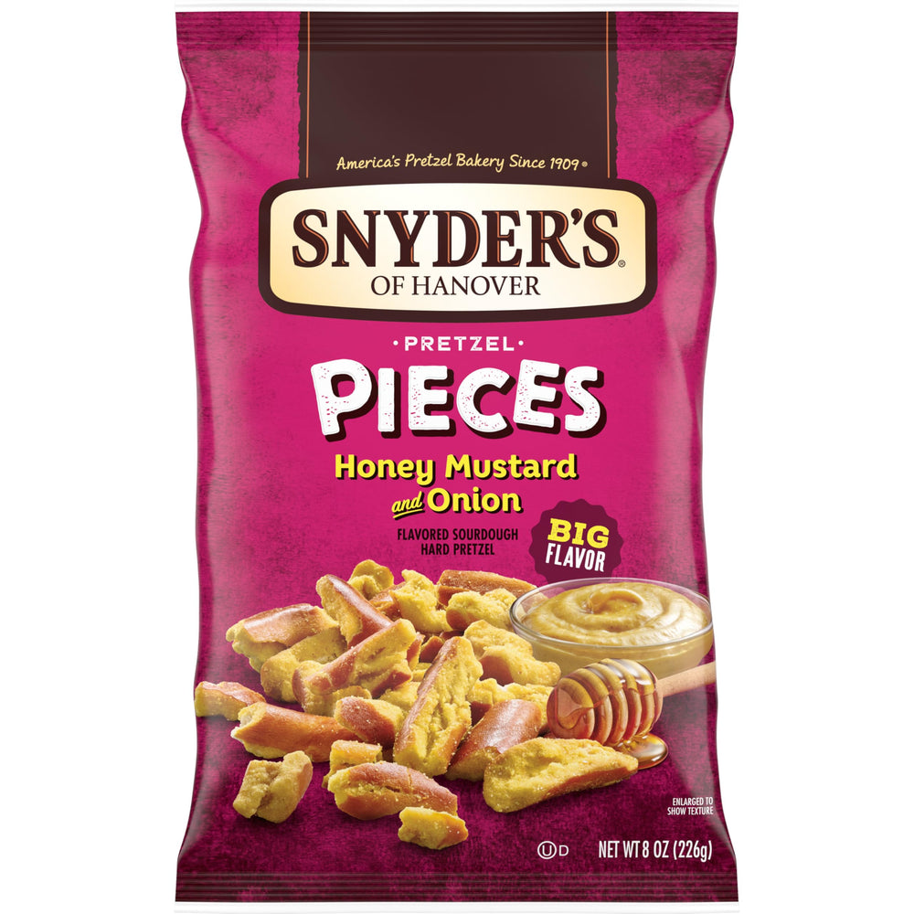 Snyder's of Hanover honey mustard and onion pretzel pieces in the bag, ready for snacking.