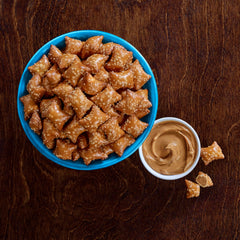 Serving suggestion with pretzel pieces arranged for party snack moments.
