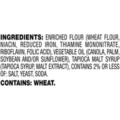 Open bag of Snyder's Old Tyme Pretzels reveals thick, dark pieces ready for dipping.