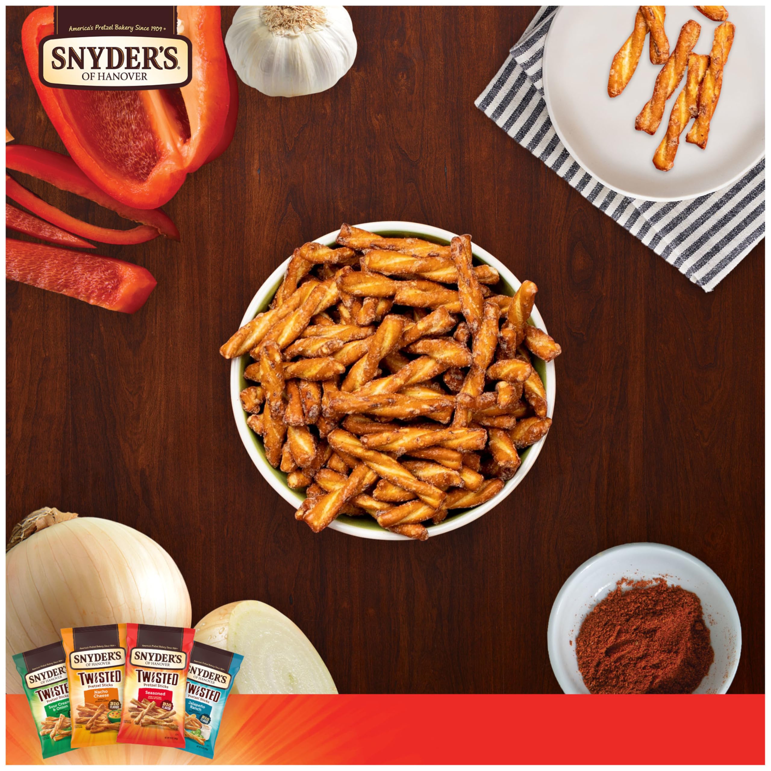 A bowl-ready Snyder's pretzel sticks, ideal for sharing with friends.